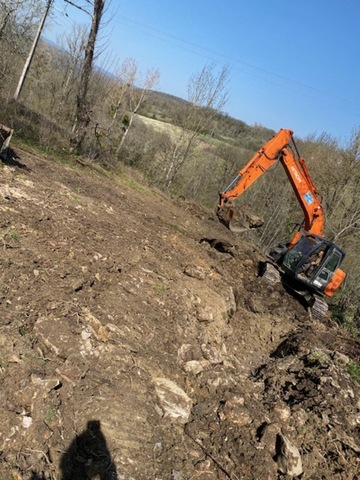 Défrichage terrain puis réalisation terrassement à Causse-et-Diège