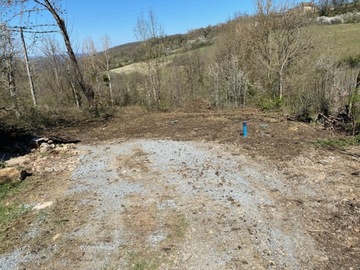 Défrichage terrain puis réalisation terrassement à Causse-et-Diège